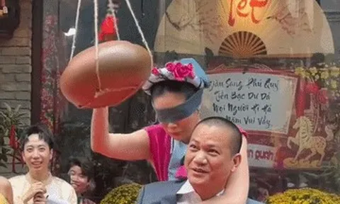 Hoa hậu Khánh Vân được chồng hơn 17 tuổi cõng chơi trò đập niêu