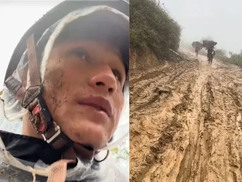 Bùn bắn đầy mặt, thầy giáo trẻ kiên trì hướng dẫn học trò đến trường