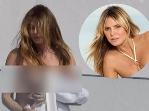 Siêu mẫu Heidi Klum gây tranh cãi khi bán nude tắm nắng ở ban công