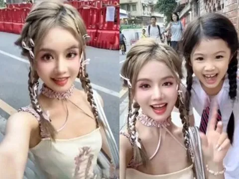 Mẹ hotgirl mặc váy 2 dây đưa con gái đi học khiến ai cũng nhìn vì trẻ đẹp như học sinh, biết tuổi thật mới giật mình