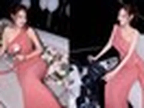 Hoa hậu Di Khả Hân diện đầm hồng ôm sát, đón tuổi mới trên du thuyền